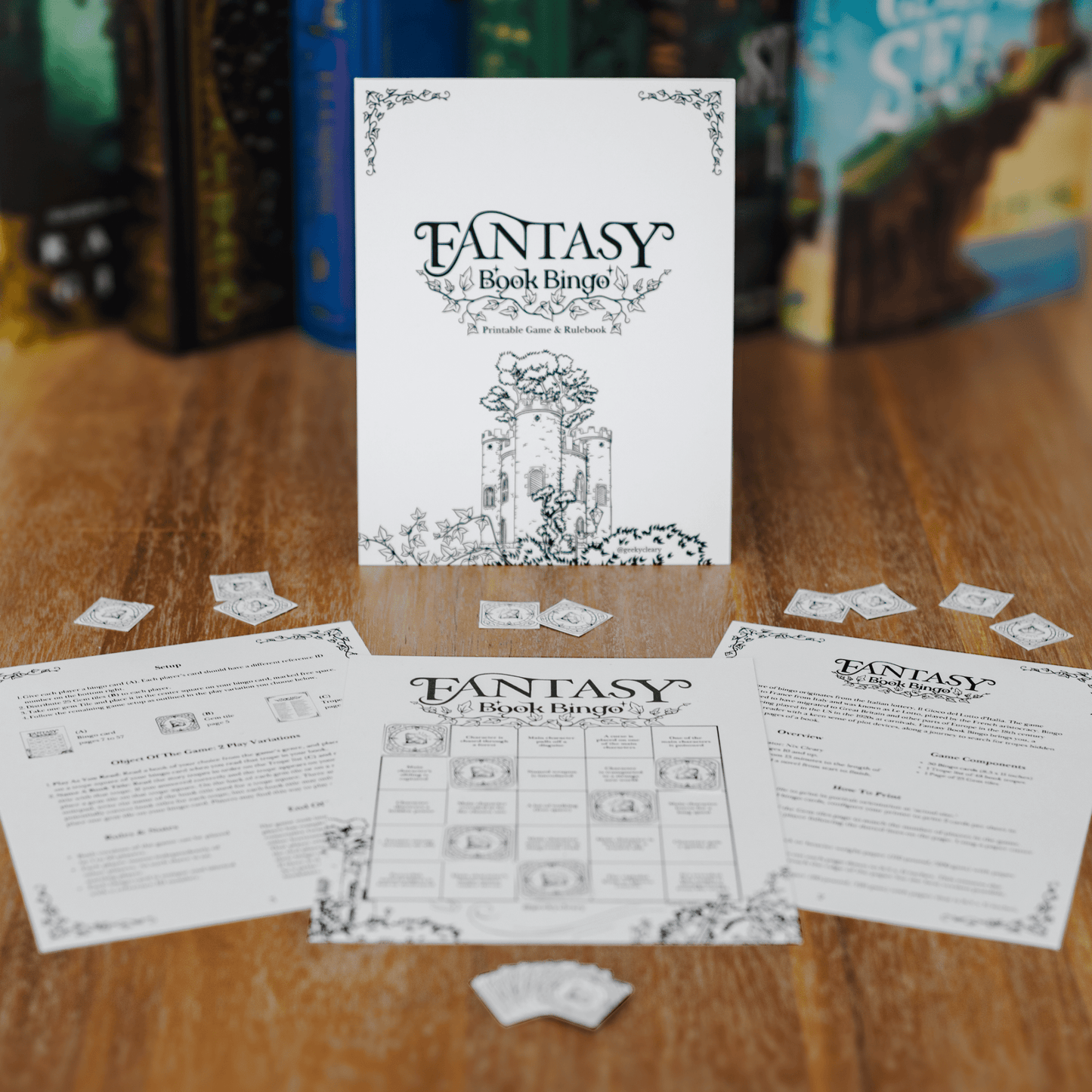 Fantasy Book Bingo Game digital download for readers full game viewed with game pieces from a front angle on a wooden table with books in the background.