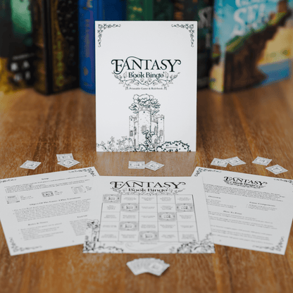 Fantasy Book Bingo Game digital download for readers full game viewed with game pieces from a front angle on a wooden table with books in the background.
