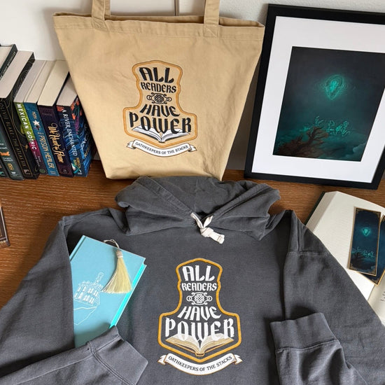All Readers Have Power - reader armor apparel on desk.