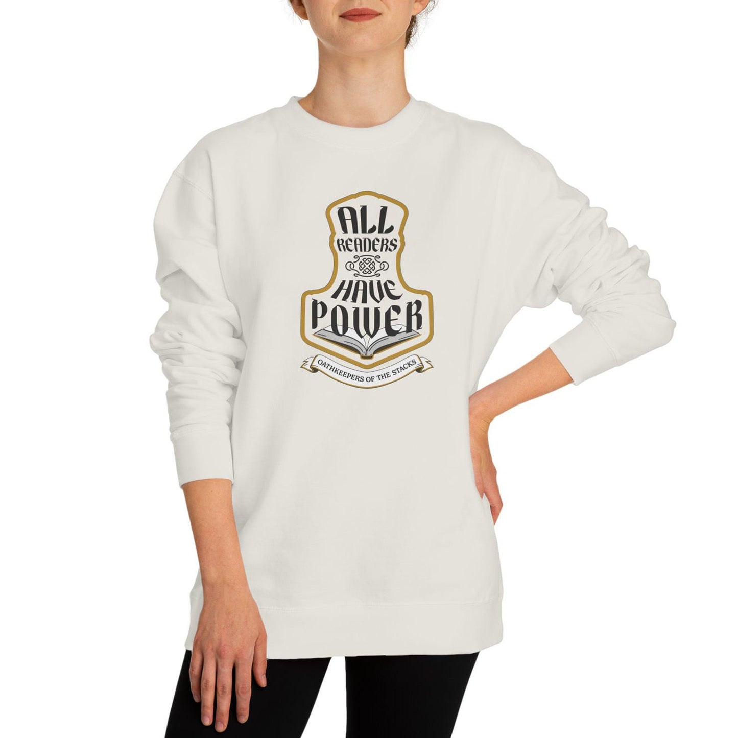 All Readers Have Power reader armor ivory sweatshirt worn by a book hoarder in black pants.