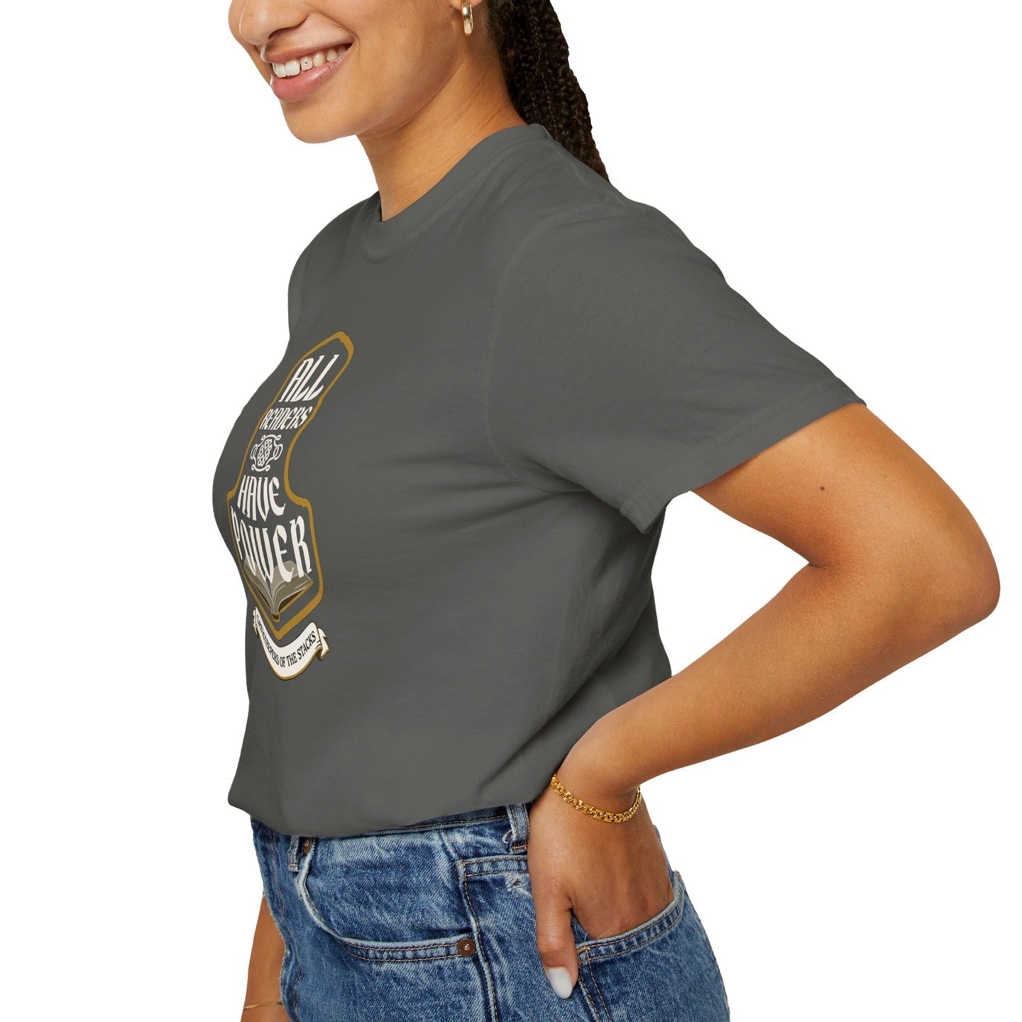 All Readers Have Power reader armor t-shirt side in pepper worn by a book hoarder.