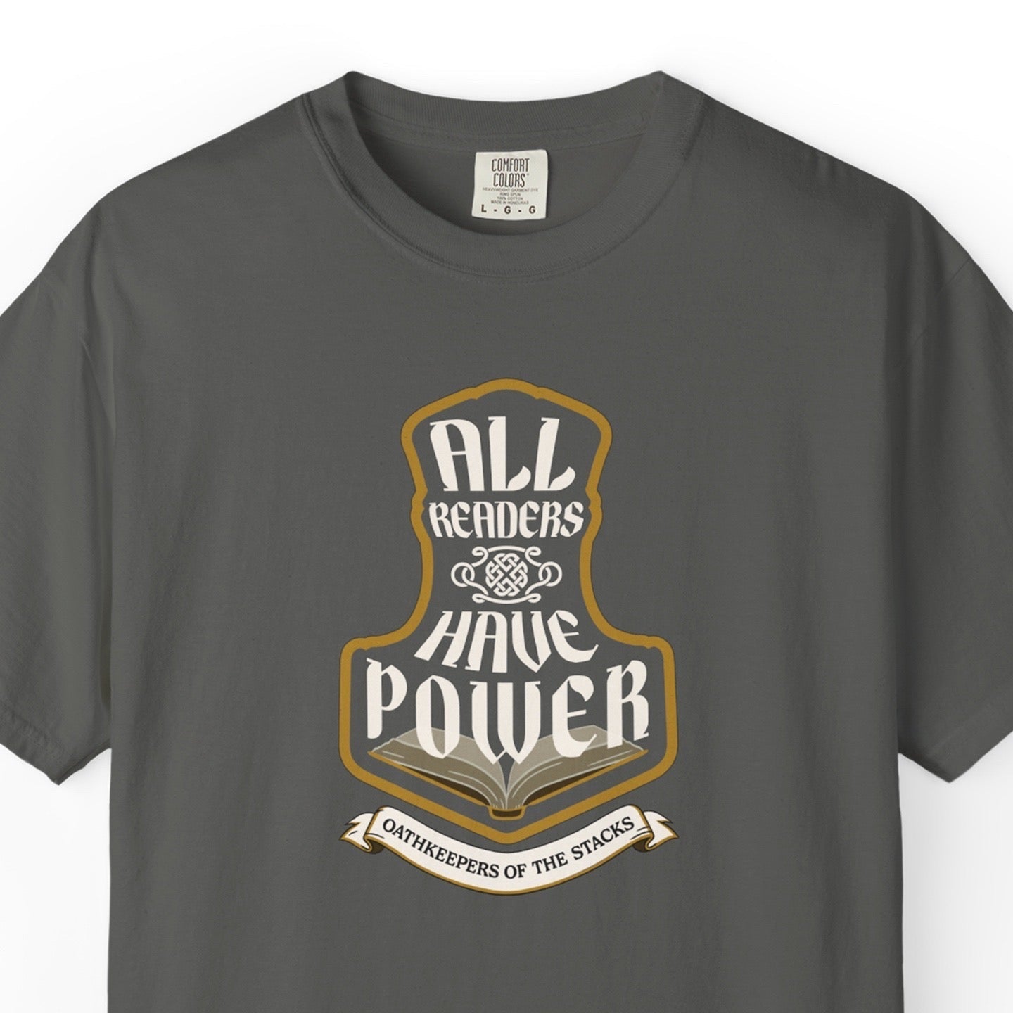 Pepper fantasy reader tee closeup with All Readers Have Power hammer emblem on the chest.