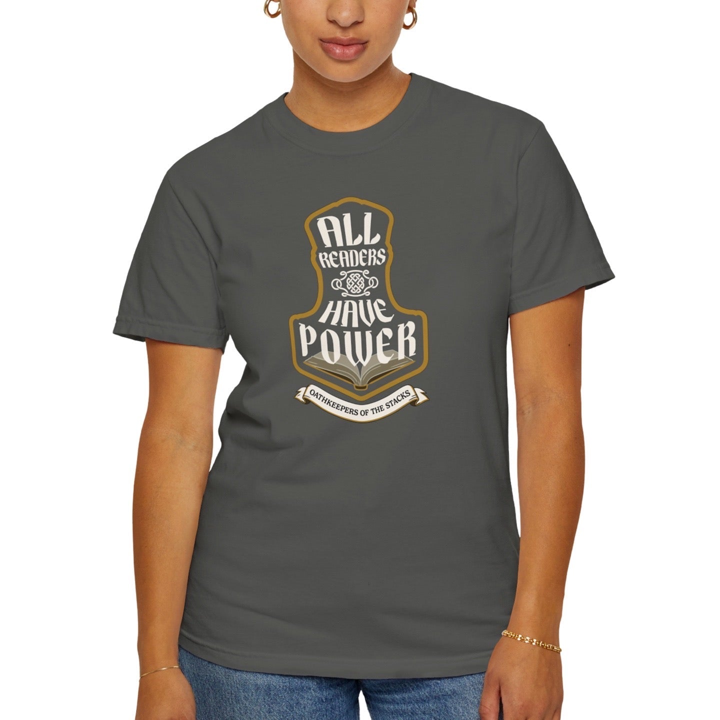 All Readers Have Power reader armor t-shirt flat front in pepper worn by a book lover.