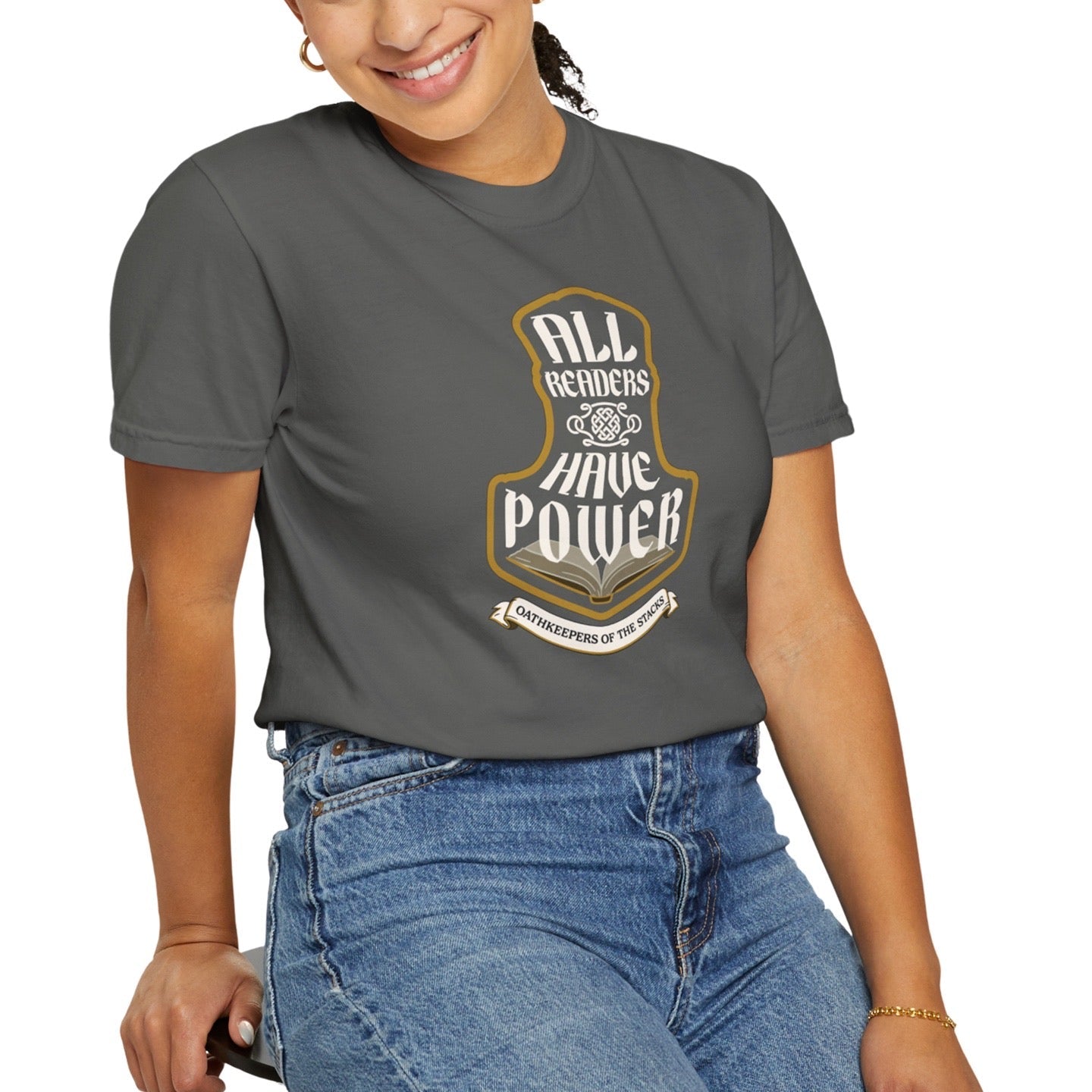 All Readers Have Power reader armor t-shirt angled in pepper worn by an avid reader.