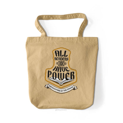 Natural canvas fantasy book tote with All Readers Have Power hammer crest on the front.