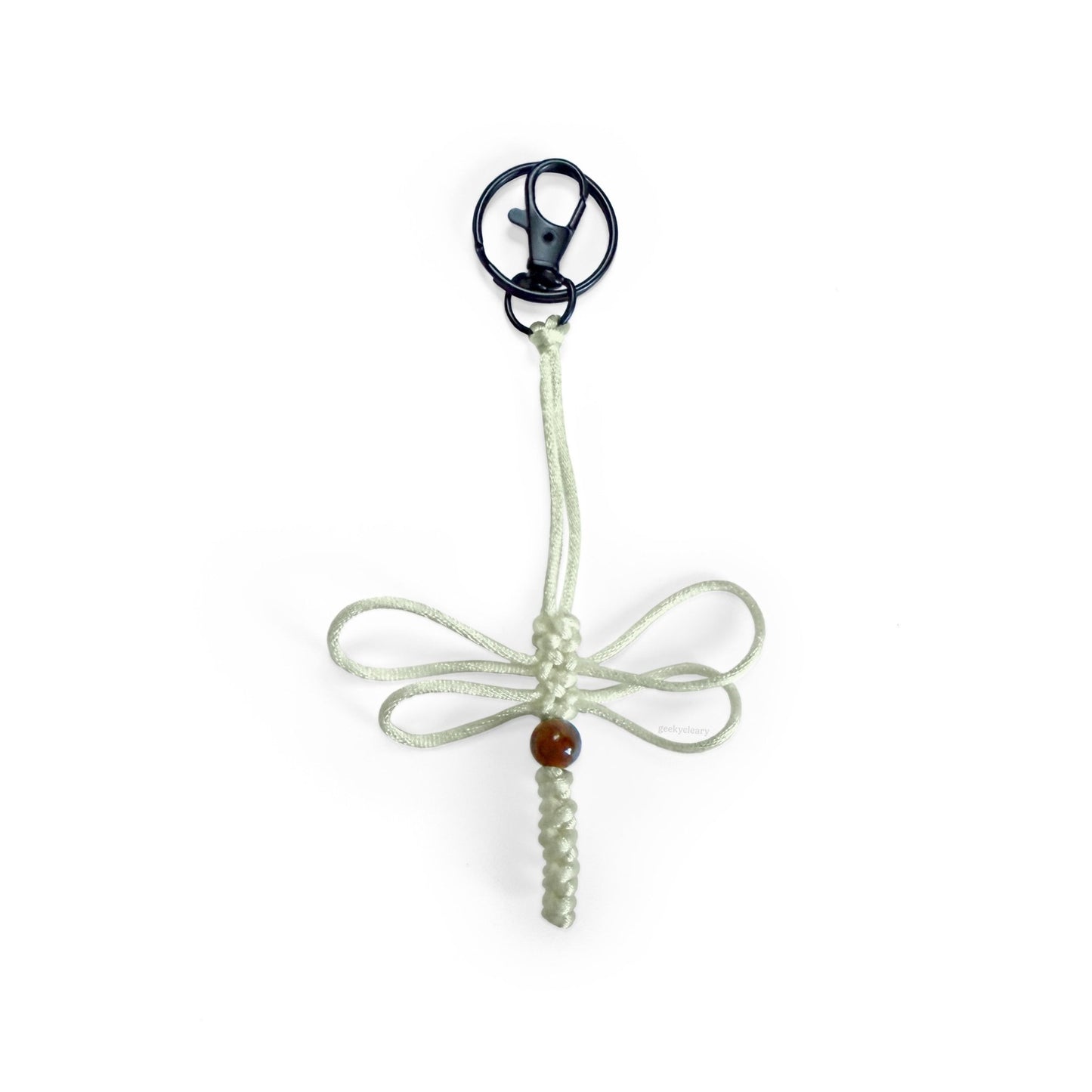 Bone-colored dragonfly limited series keychain handwoven with silk cord & real agate bead. Made with durable clip & keyring.
