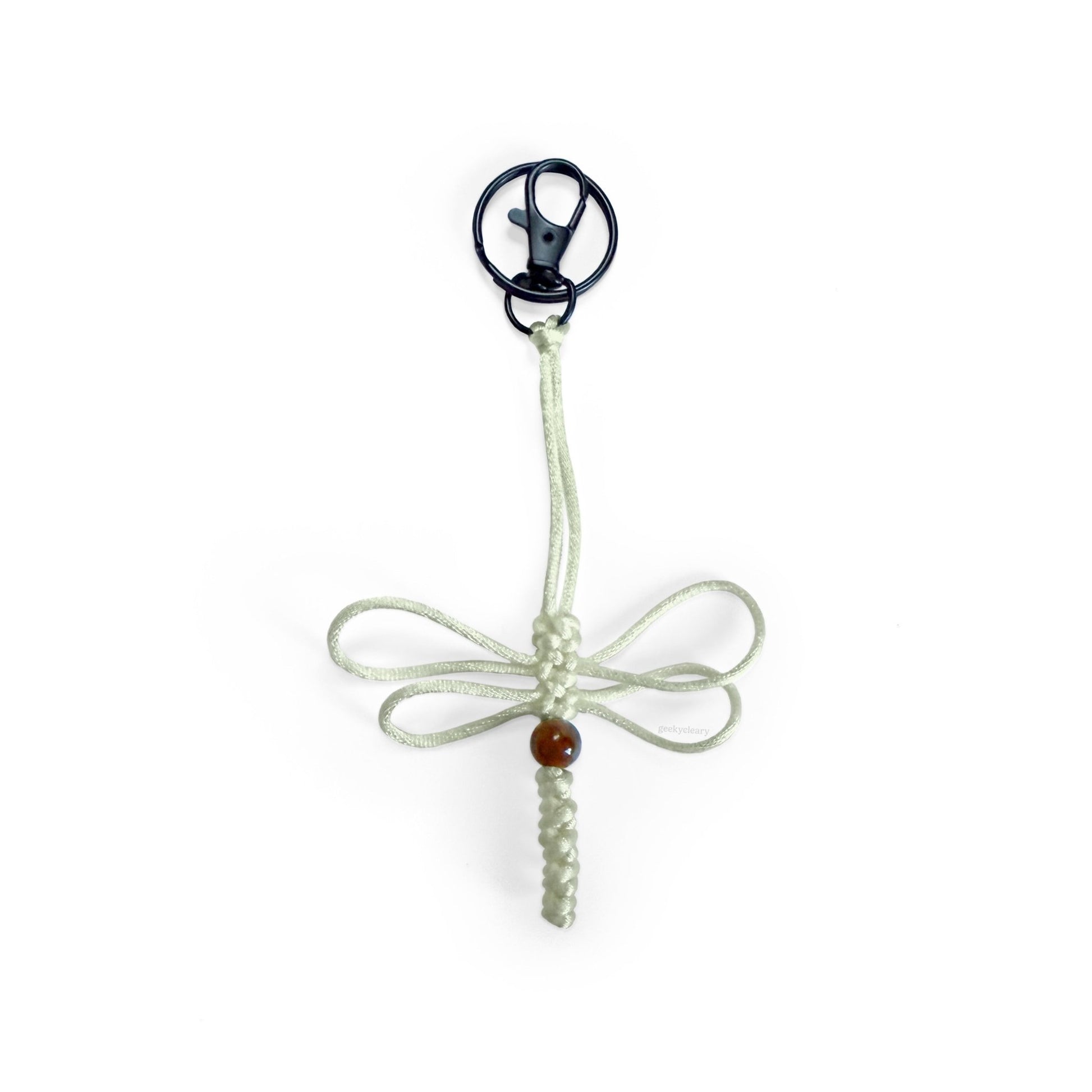 Bone-colored dragonfly limited series keychain handwoven with silk cord & real agate bead. Made with durable clip & keyring.