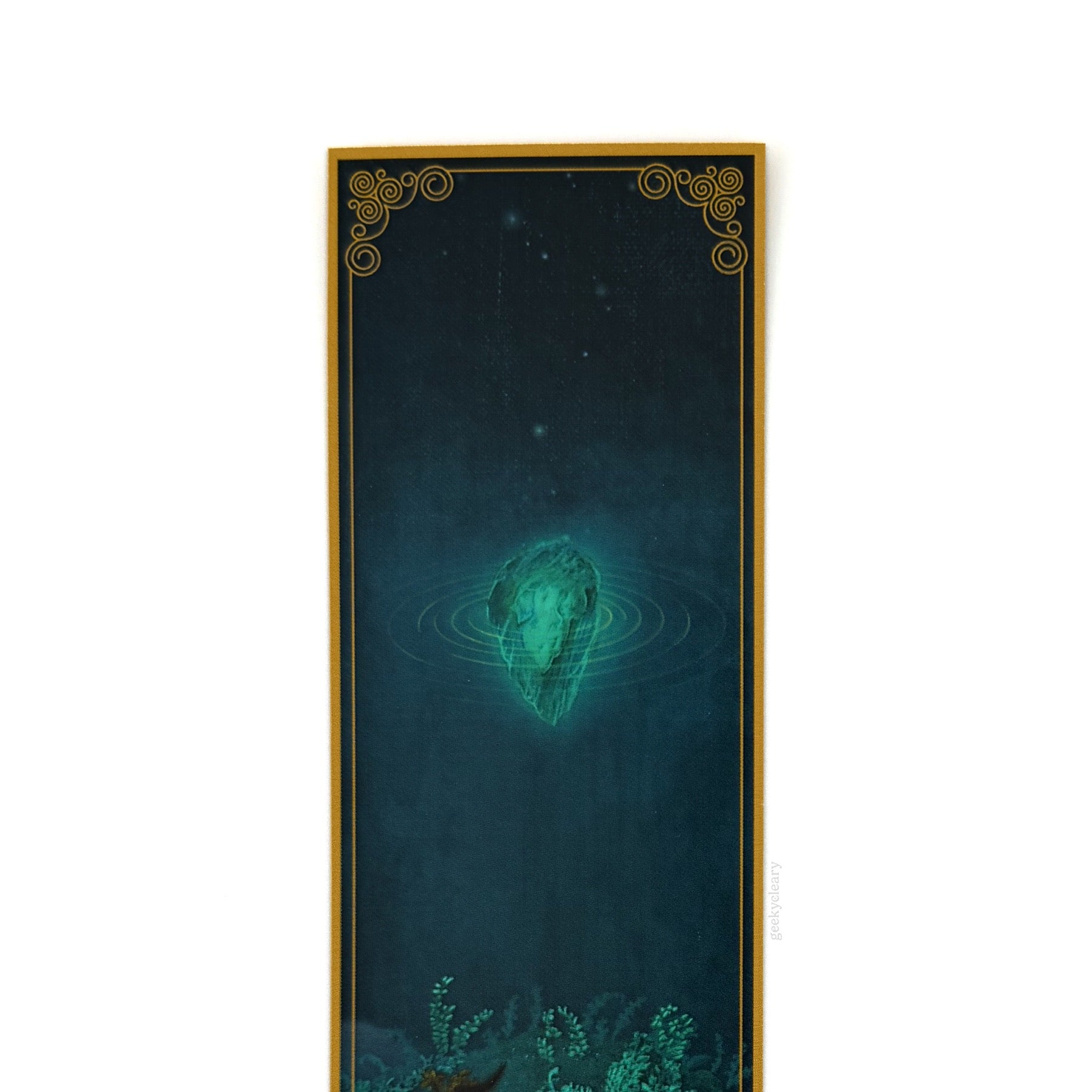 Top view close-up of Floating Crystalized Magic bookmark showing the crystal artwork and filigree border detail.