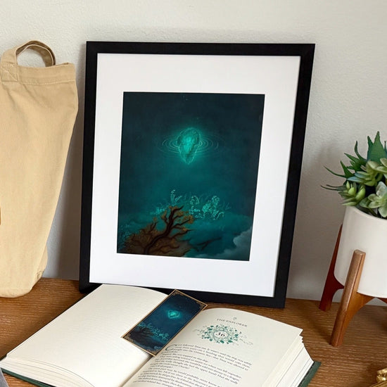 Floating Crystalized Magic art print with matching bookmark inside a book.